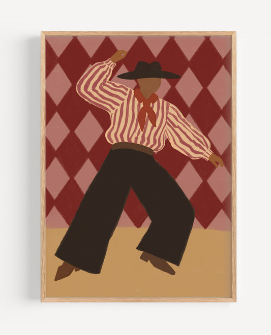 A framed art print featuring a stylized illustration of a cowboy dancing in front of a red and pink argyle background, mounted on a light gray wall.