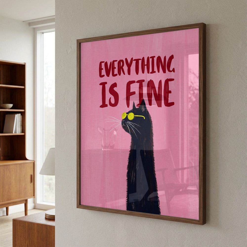 Framed artwork with a black cat wearing sunglasses and 'Everything is Fine' text on a pink background, hanging on a wall.