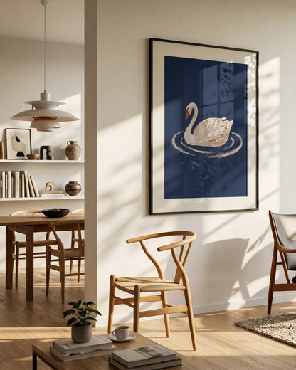 Modern interior with a framed swan artwork on the wall, wooden chair, and dining table.