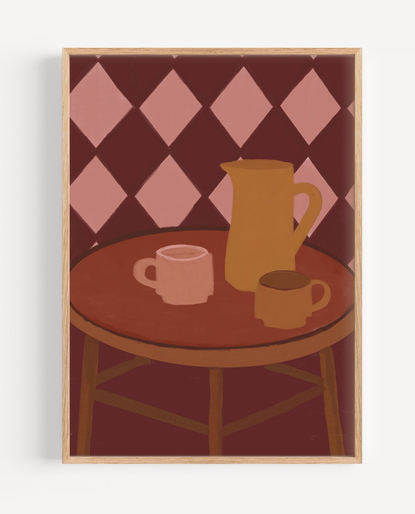 A framed art print featuring a stylized illustration of a table setting with a pink and burgundy argyle background, a brown table, a yellow-orange pitcher, and two mugs.