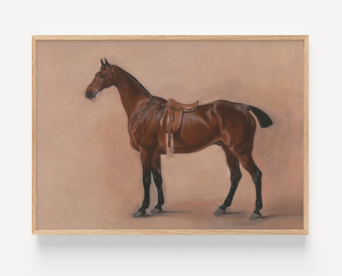 A framed painting of a brown horse standing in profile against a warm beige background, shown hanging on a light wall.