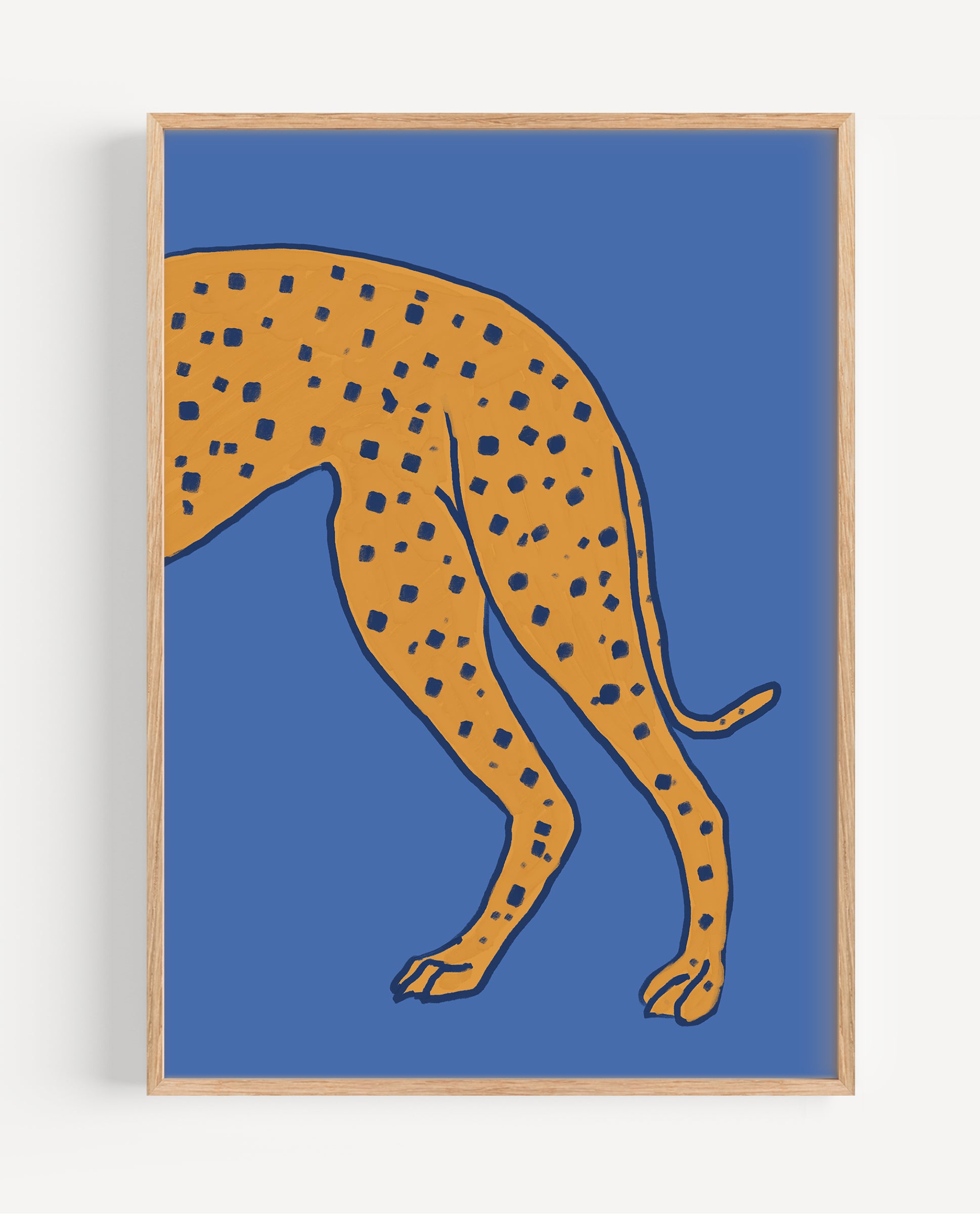 Framed artwork of a yellow cheetah on a blue background