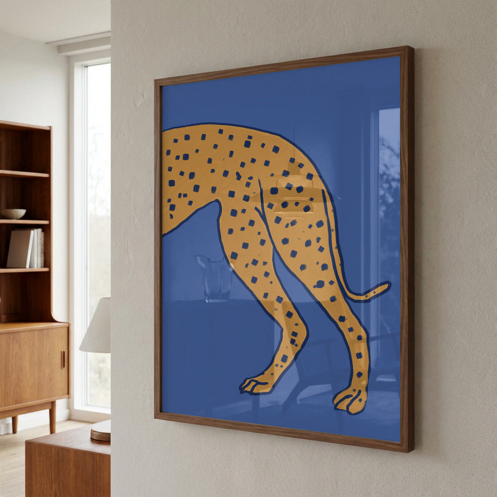 The Cheetah framed poster hanging in modern living room