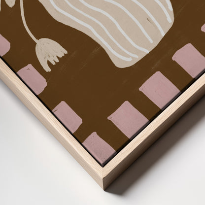 Framed artwork with abstract design on a brown background