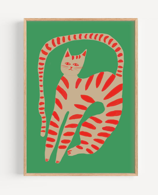 Framed artwork of a stylized cat with red stripes on a green background