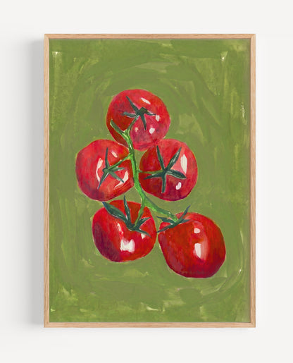 A framed painting of five red cherry tomatoes on a vine against a textured olive green background, displayed in a light wood frame on a white wall.